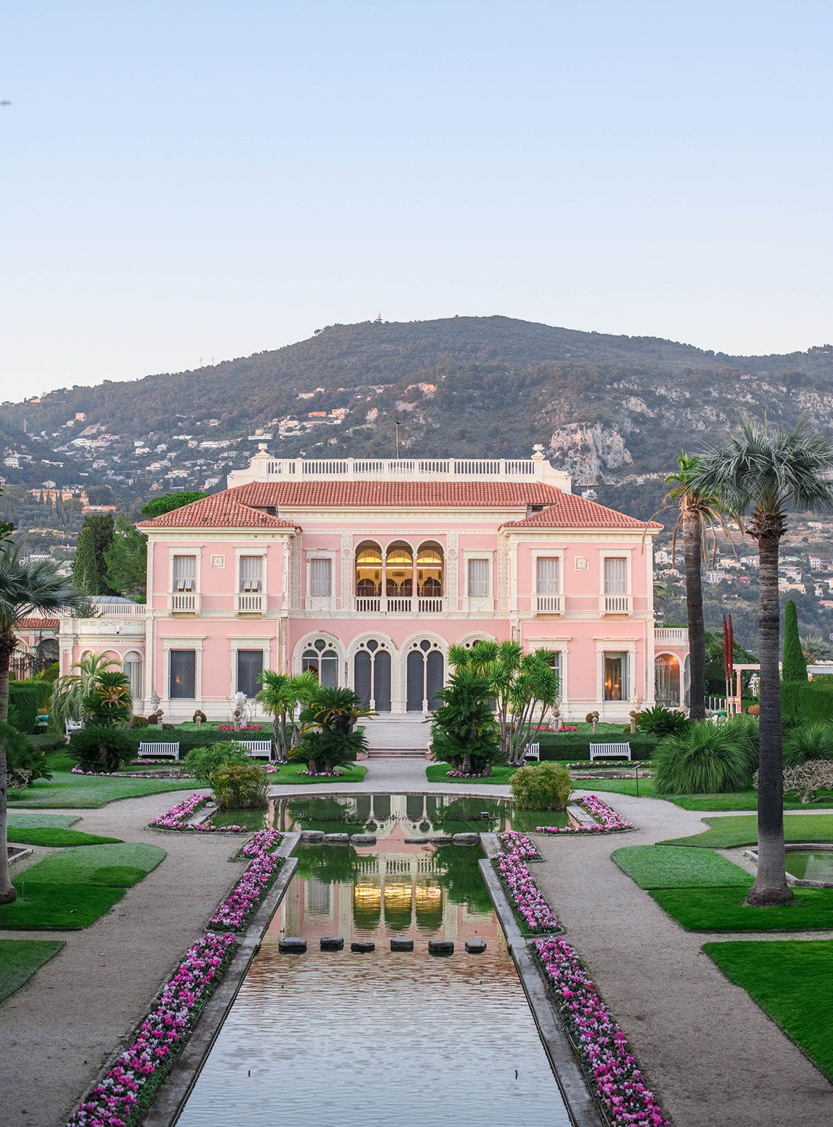 Long French garden perspective leading toward Villa Ephrussi de Rothschild